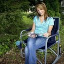 GCI Outdoor Freestyle Rocker Portable Folding Chair, Cinnamon, Mesh Back, Steel Frame, 250 lbs Capacity